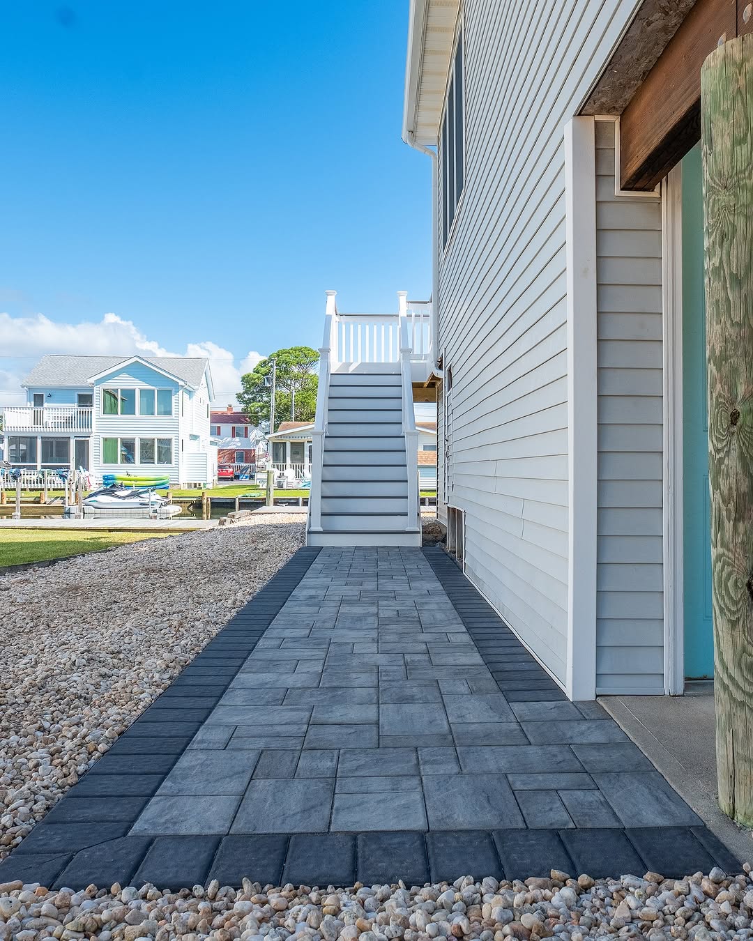 Full view of paver walkway and porch steps in Delaware