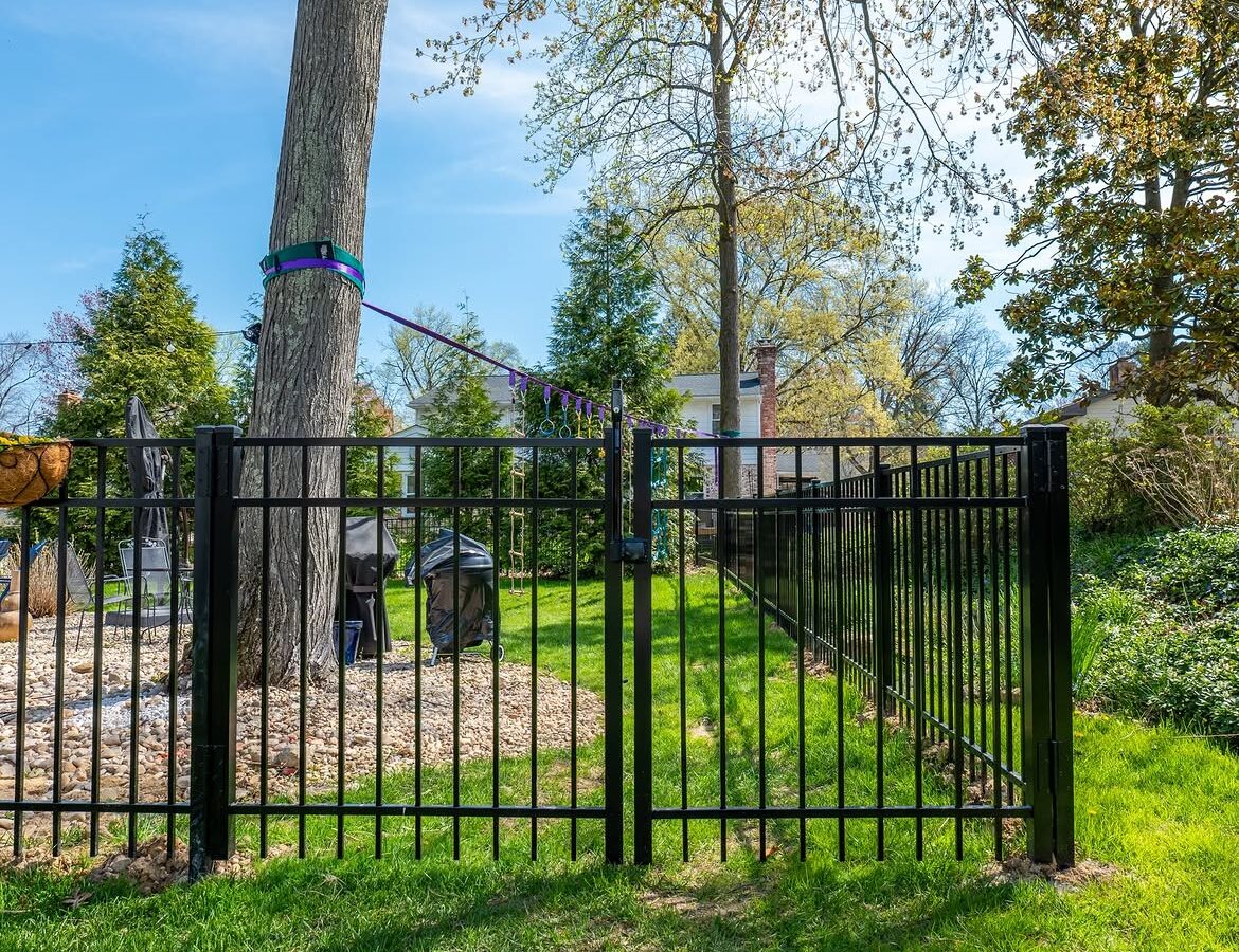 Gate detail of black aluminum fence in Delaware