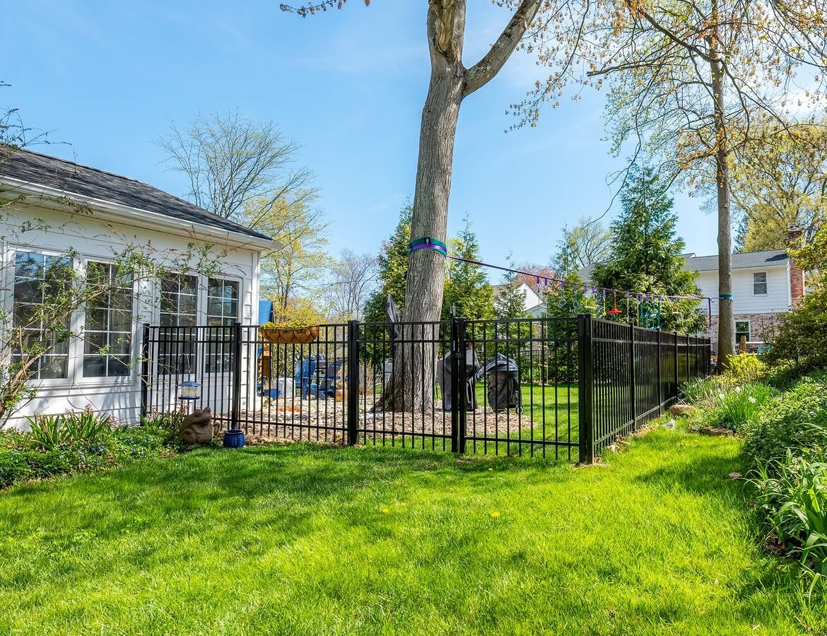 Angled view of black aluminum fence in Delaware