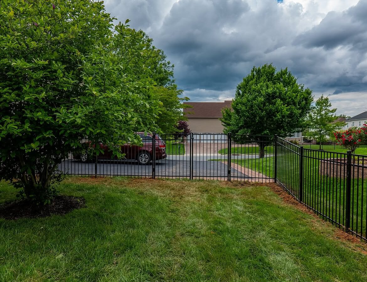 Gate detail of black aluminum fence in Delaware