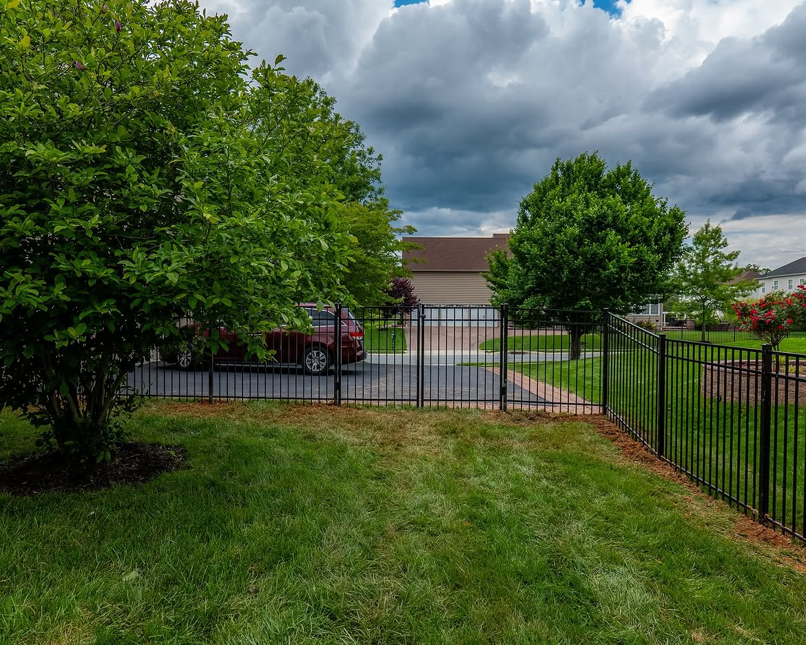 Gate detail of black aluminum fence in Delaware