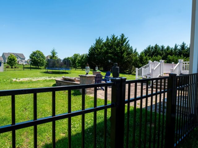 Black Aluminum Fence & Fire Pit Patio