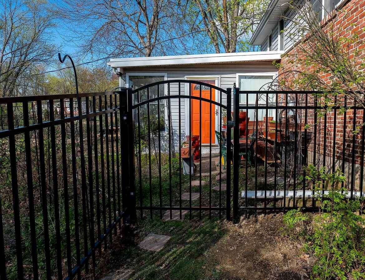 Gate and fence view of black aluminum fence in Wilmington, DE