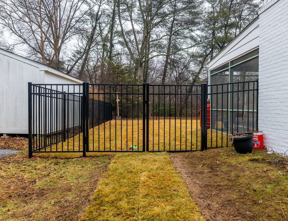 Gate detail of black aluminum fence in Newark, DE