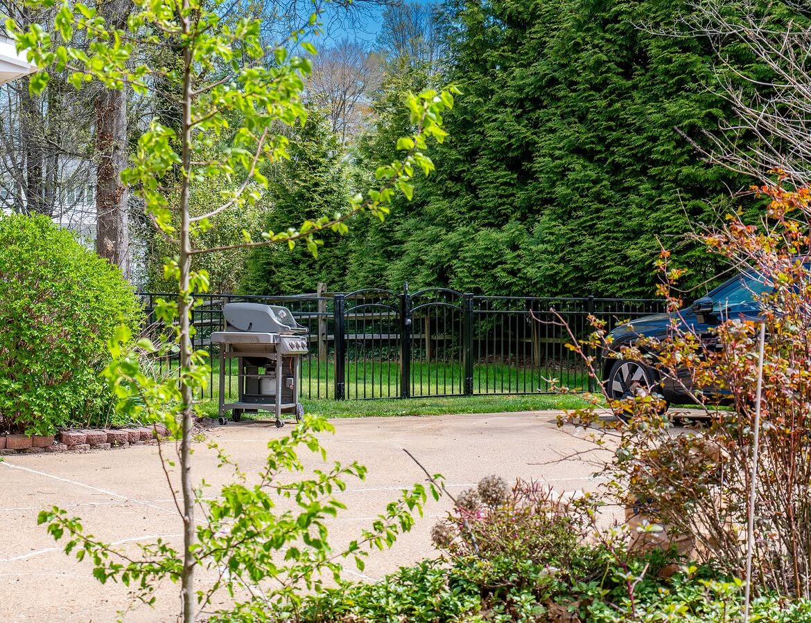 Angled view of black aluminum fence in North Wilmington, DE
