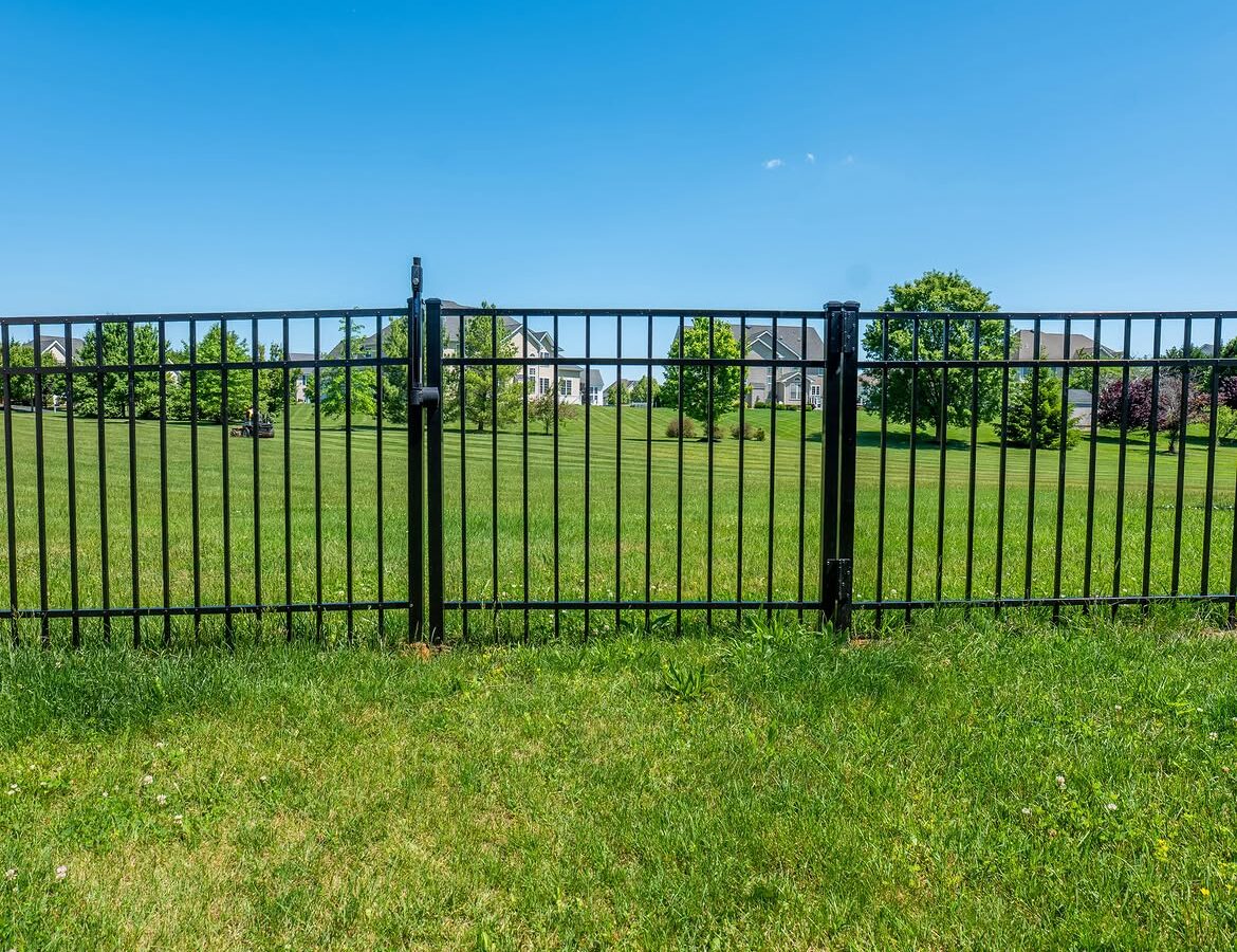 Wide view of black aluminum fence in Delaware