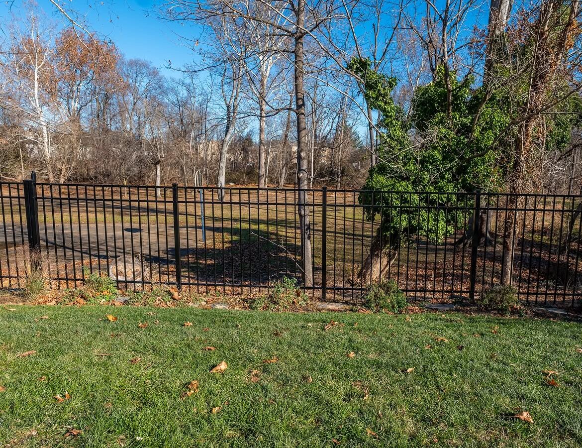 Angled view of black aluminum fence in Pike Creek, DE