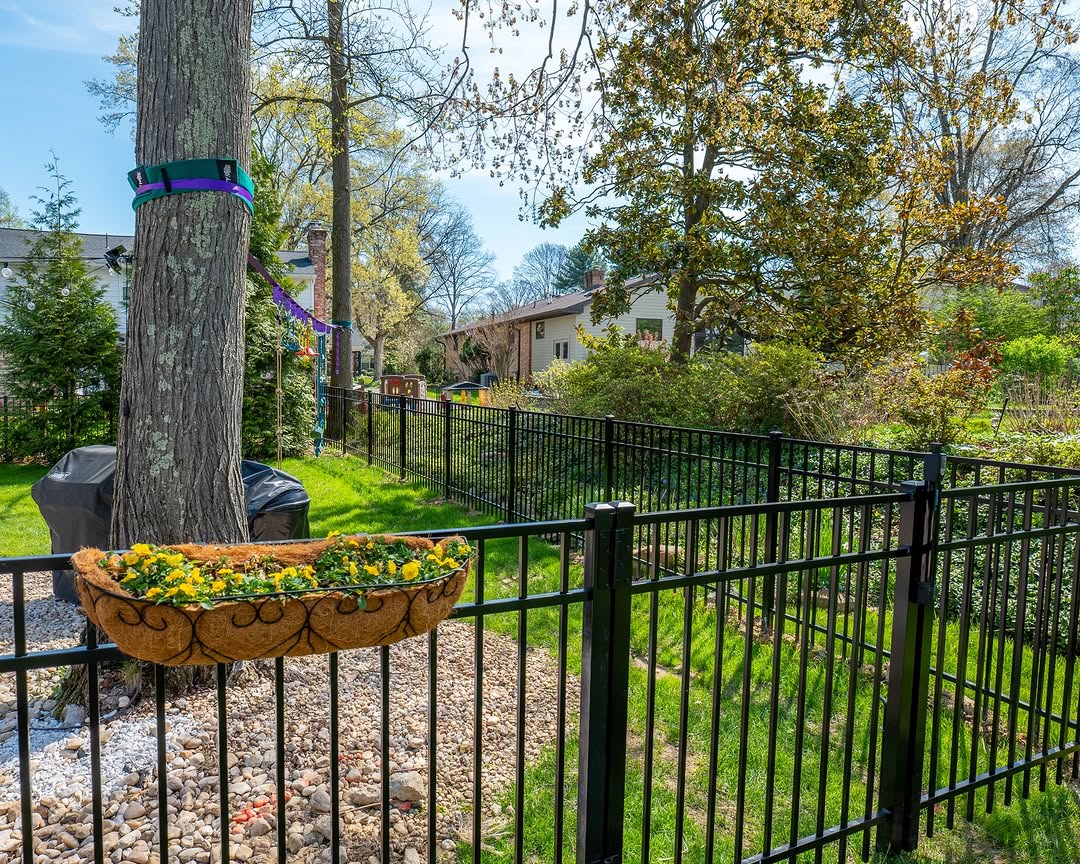 Full view of black aluminum garden fence in Delaware