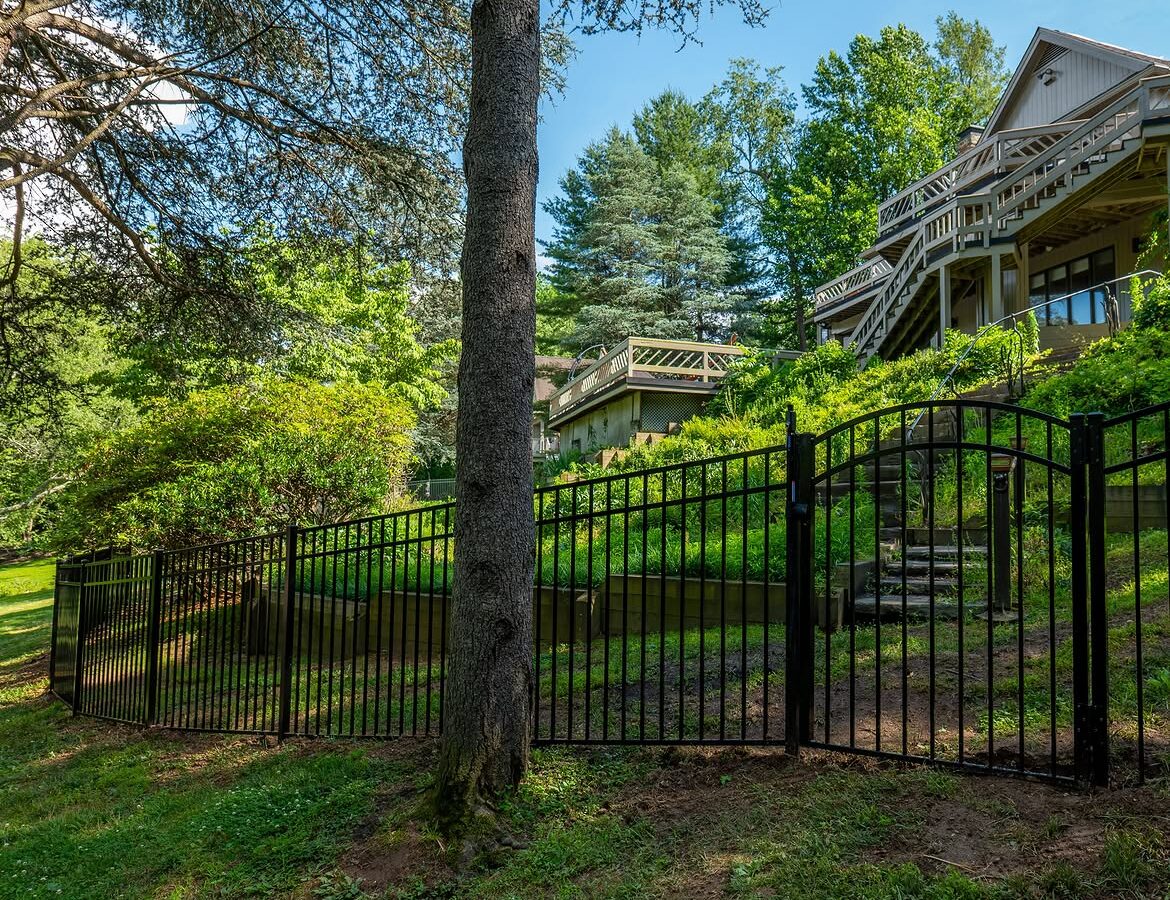 Angled view of black aluminum fence in Delaware