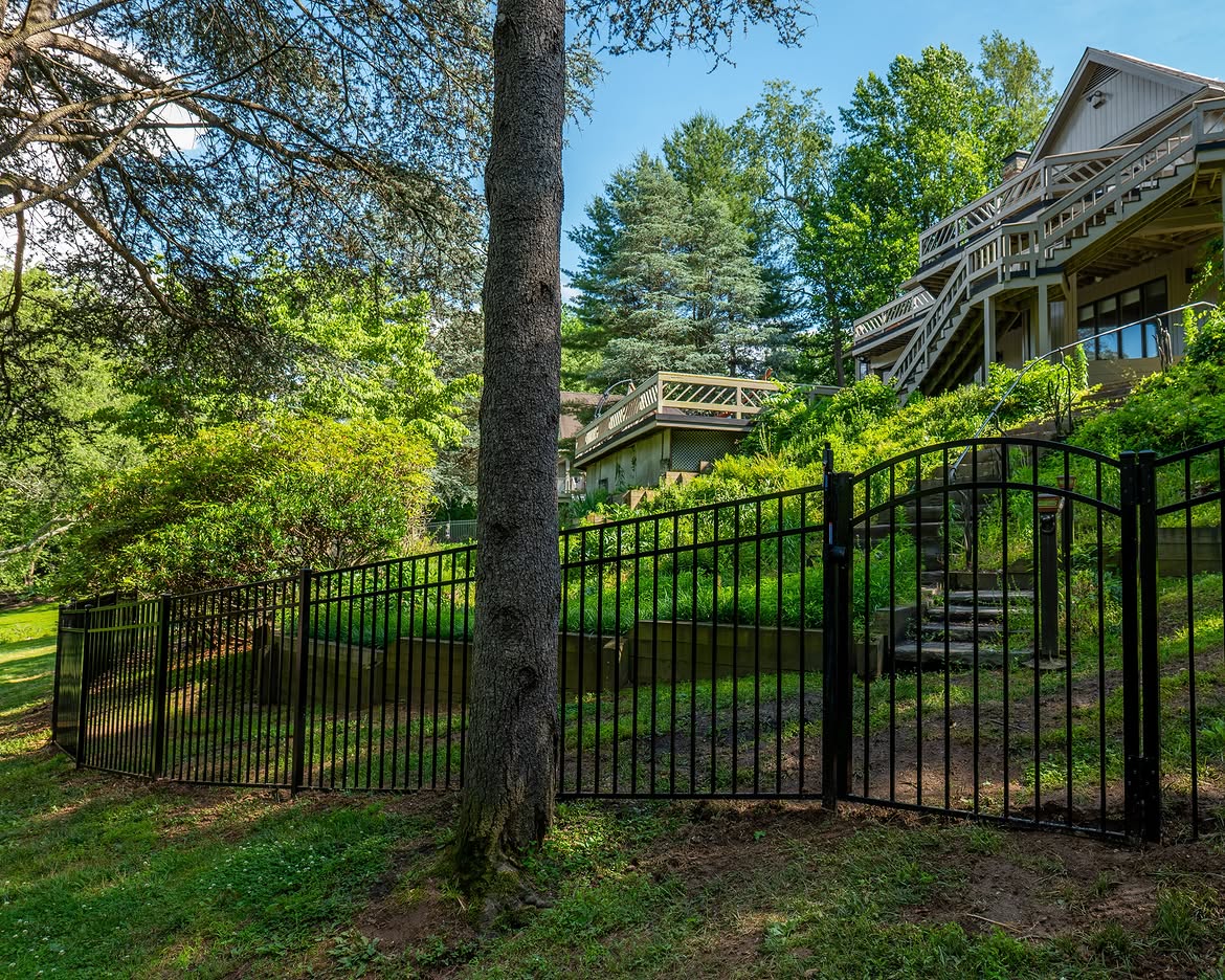 Angled view of black aluminum fence in Delaware