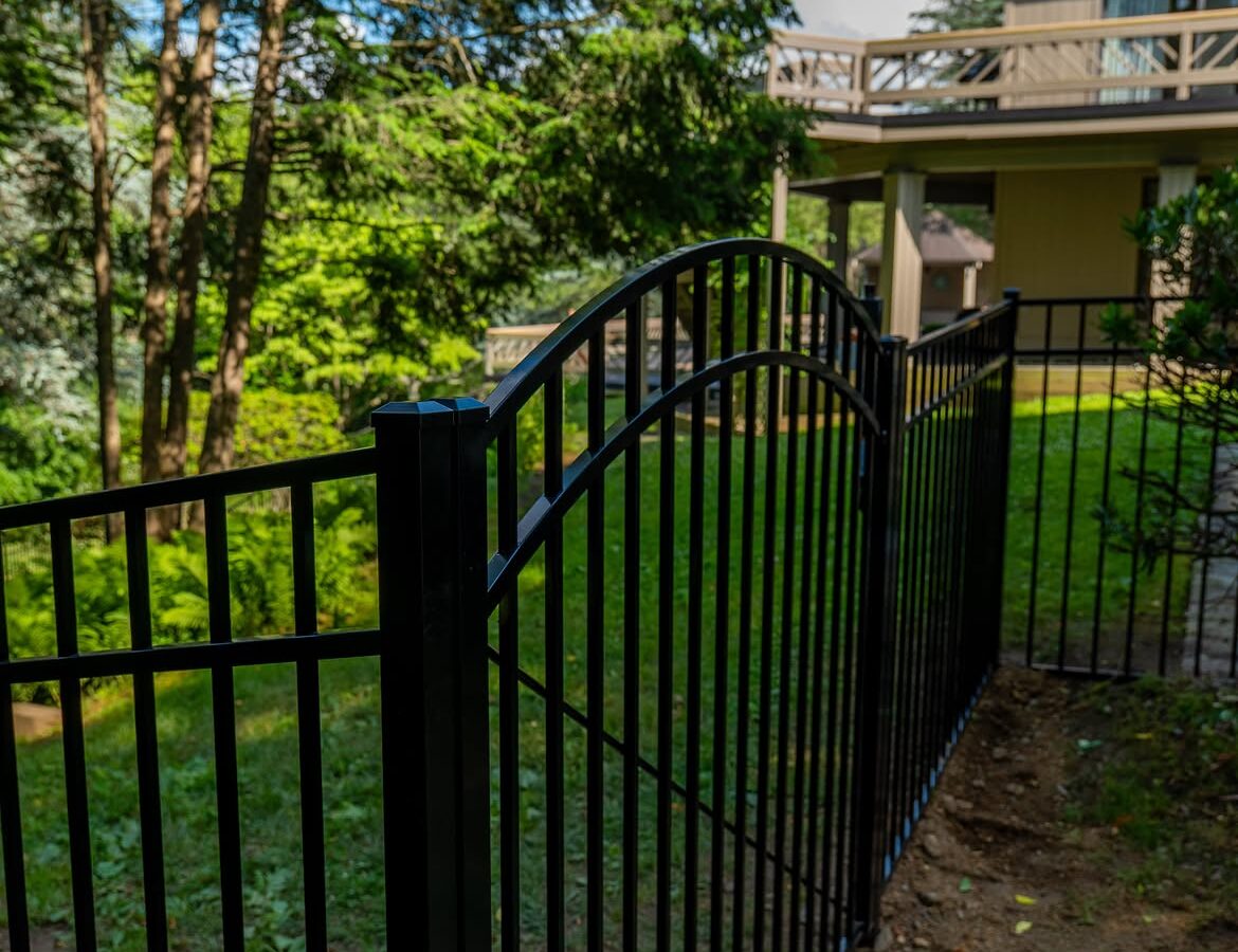 Gate and fence view of black aluminum fence in Delaware