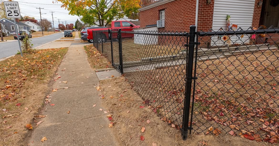 Full view of black chain link fence in Delaware