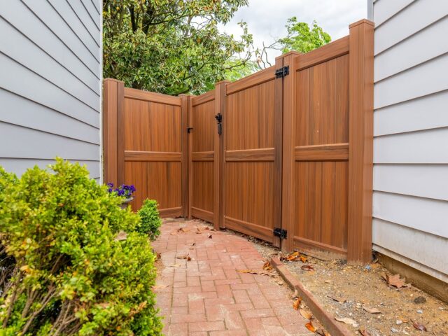Brown Vinyl Privacy Fence & Paver Patio North Wilmington – 1