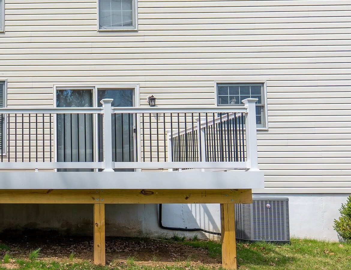 Side view of composite deck with white rails in Delaware