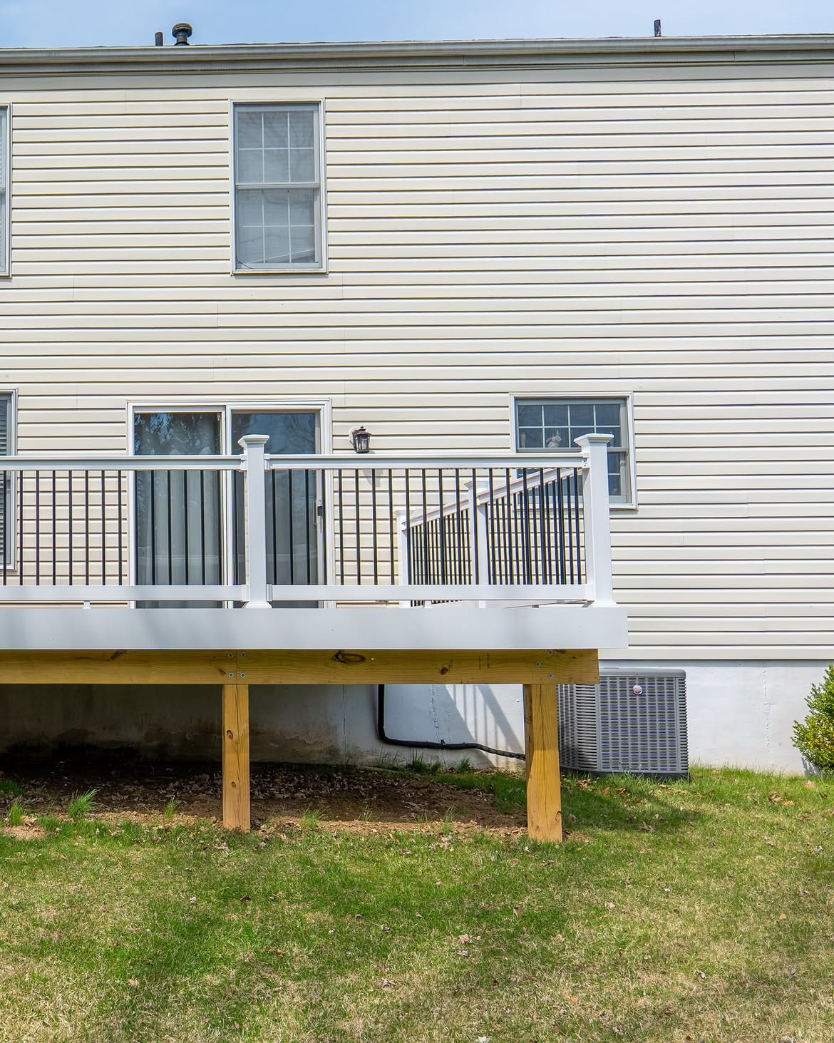 Side view of composite deck with white rails in Delaware