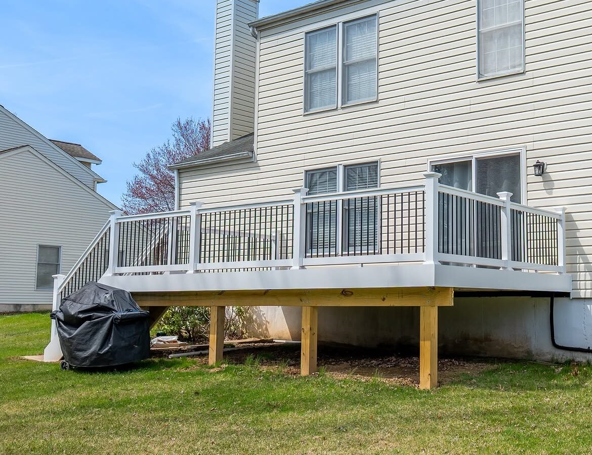 Close-up of composite deck with white rails in Delaware