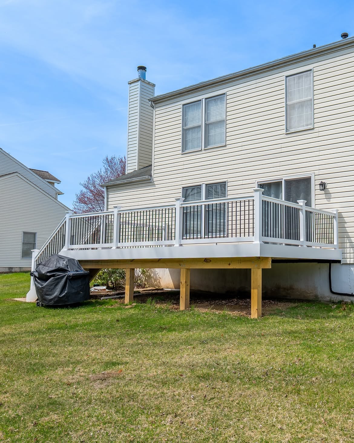 Close-up of composite deck with white rails in Delaware