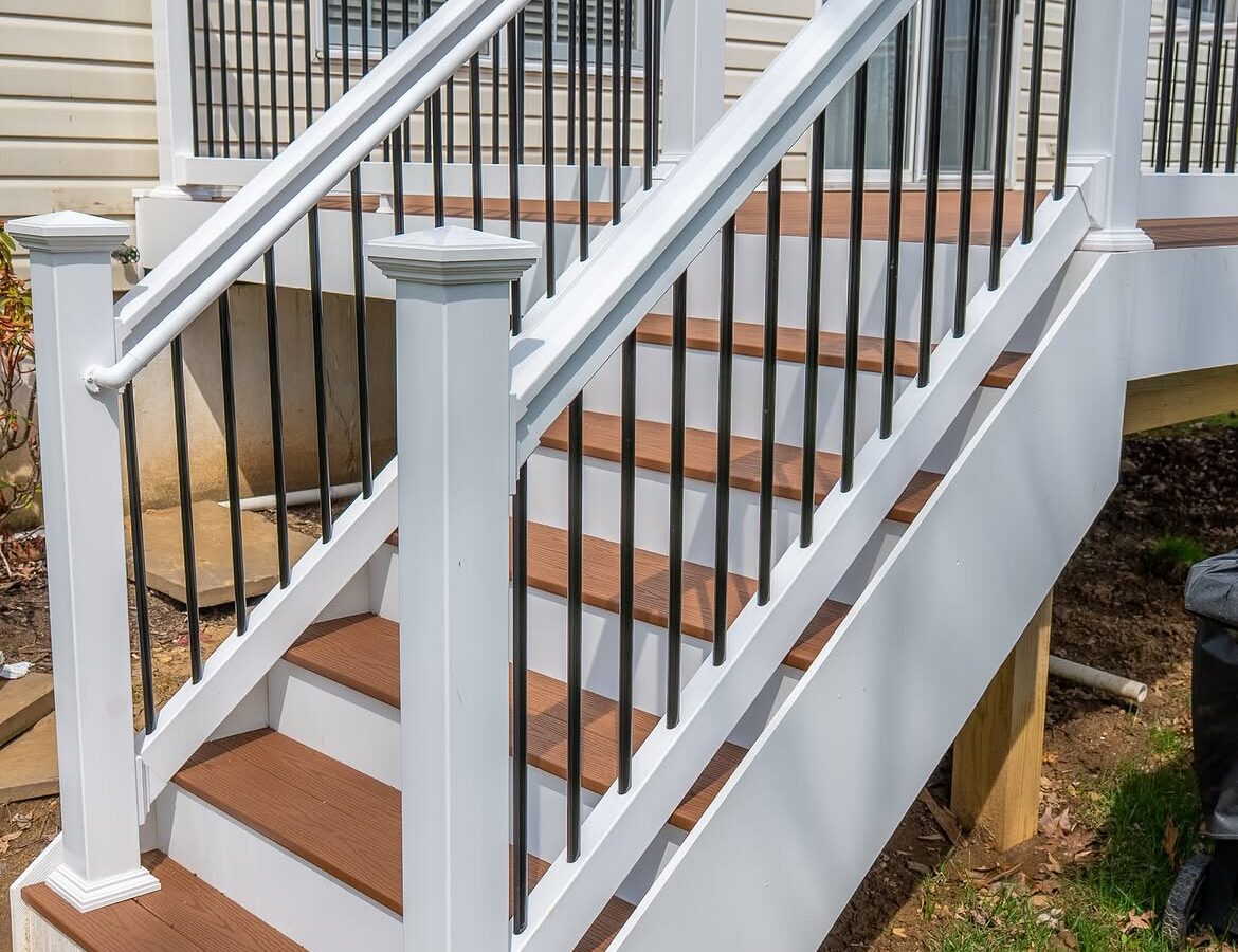 Wide view of composite deck with white rails in Delaware