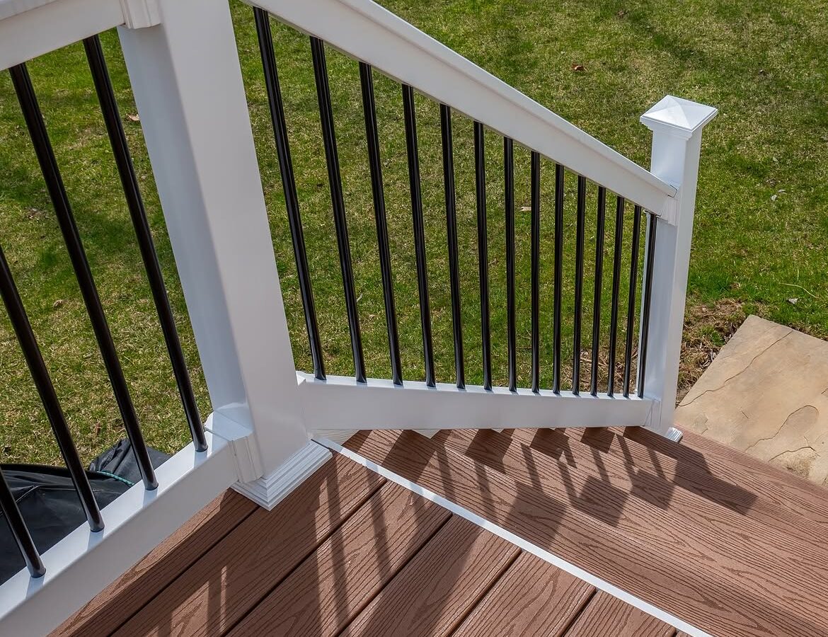 Curbside view of composite deck with white rails in Delaware