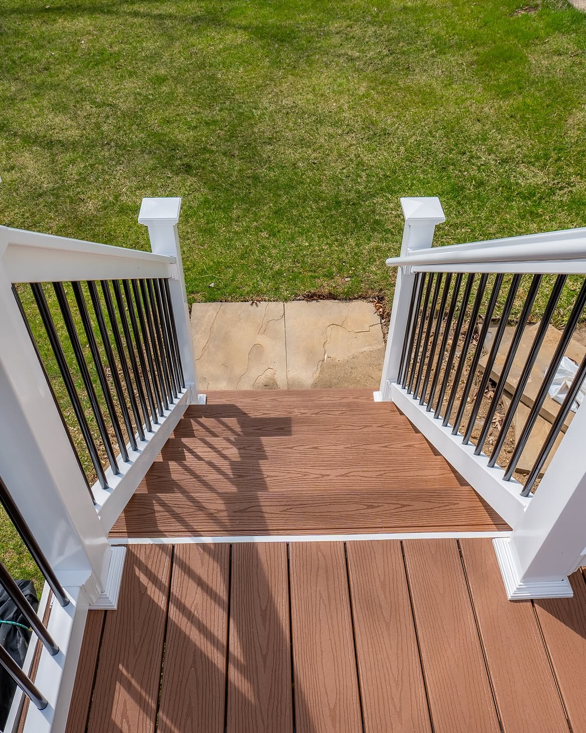 Panel detail of composite deck with white rails in Delaware