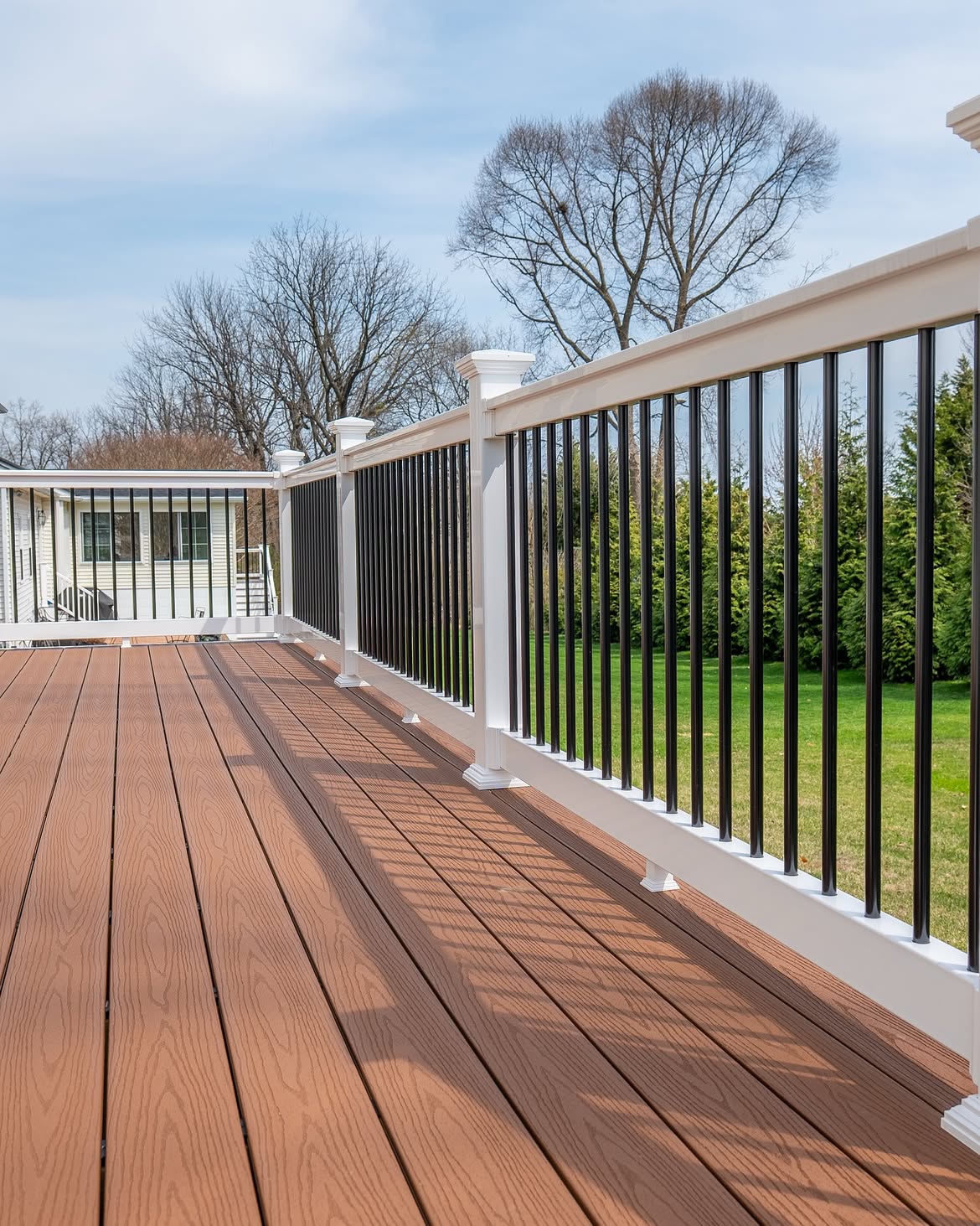 Full view of composite deck with white rails in Delaware
