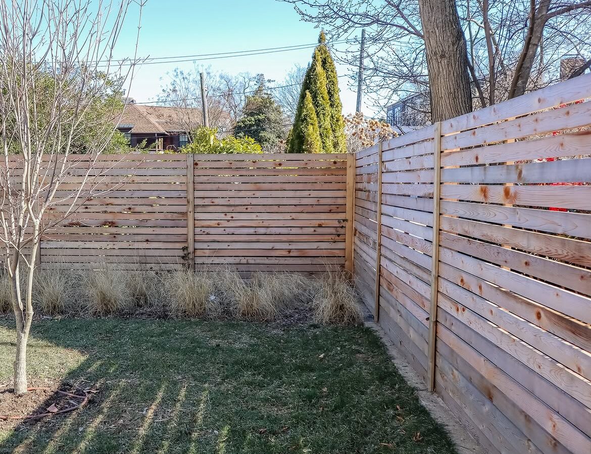 Angled view of custom wood fence in Delaware