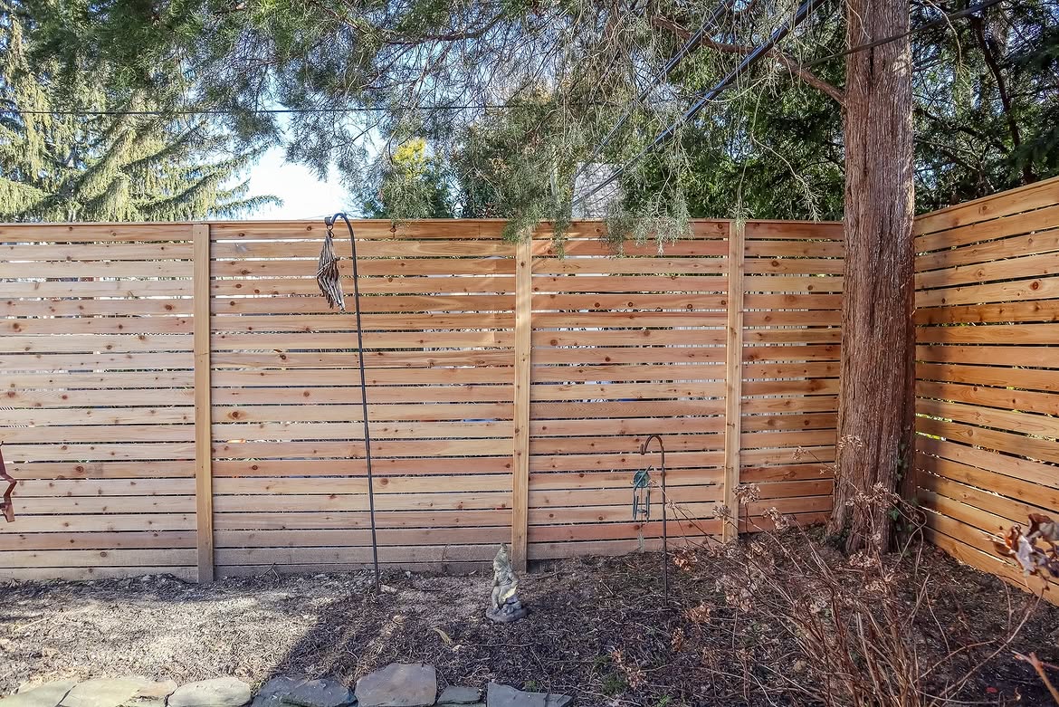Corner detail of horizontal cedar privacy fence in Wilmington, DE