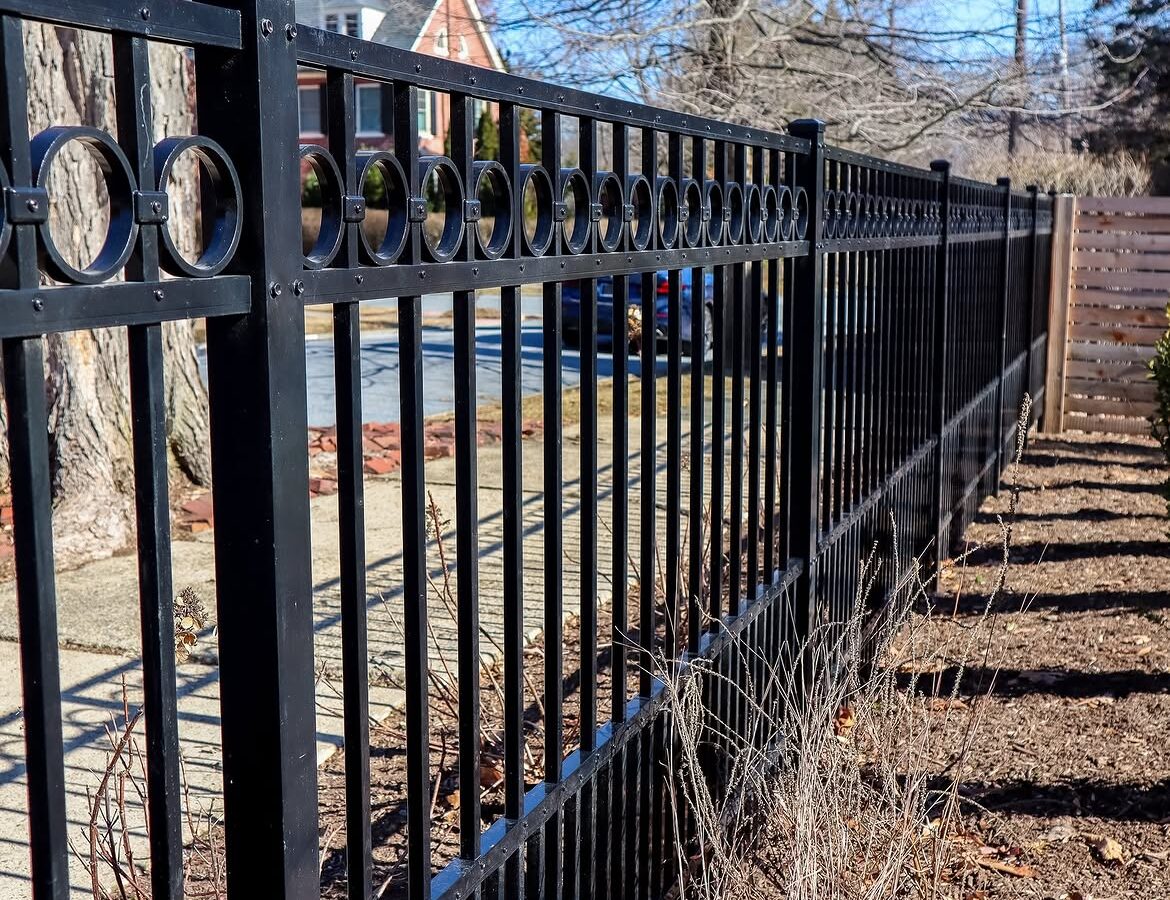 Open gate view of ornamental black aluminum fence in Delaware
