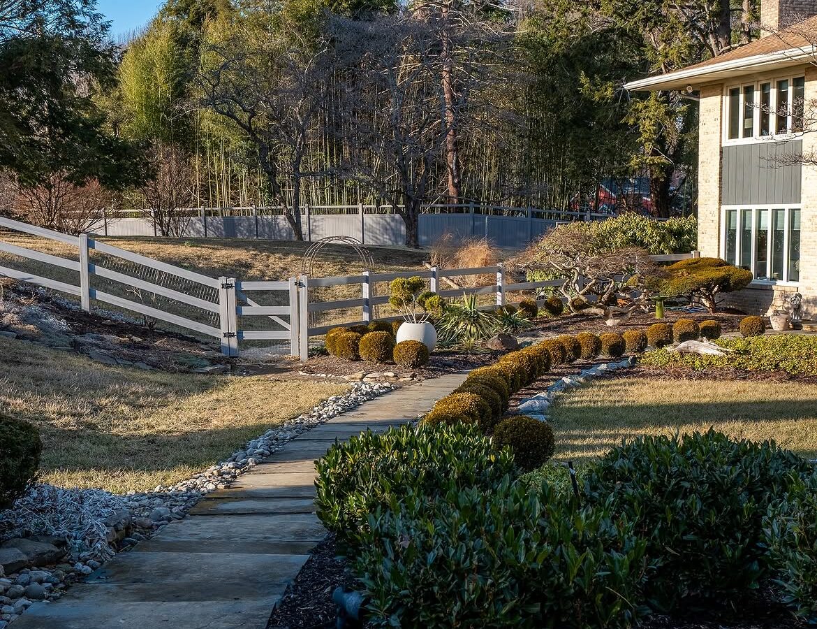 Full view of vinyl ranch rail and privacy fence in Delaware