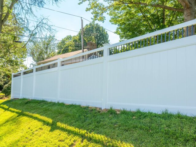 White Vinyl Privacy Fence with Aluminum Accents – 3