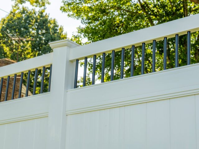 White Vinyl Privacy Fence with Aluminum Accents – 6