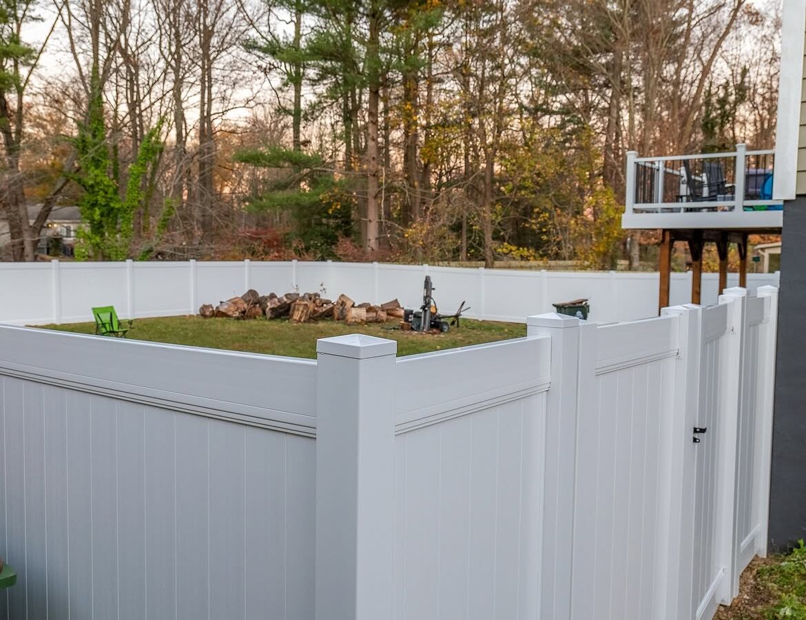 Corner detail of white vinyl privacy fence in Delaware