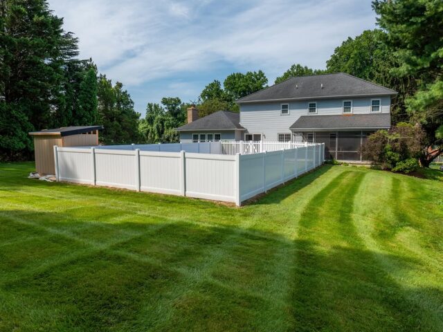 White Vinyl Privacy Fence Yard Line