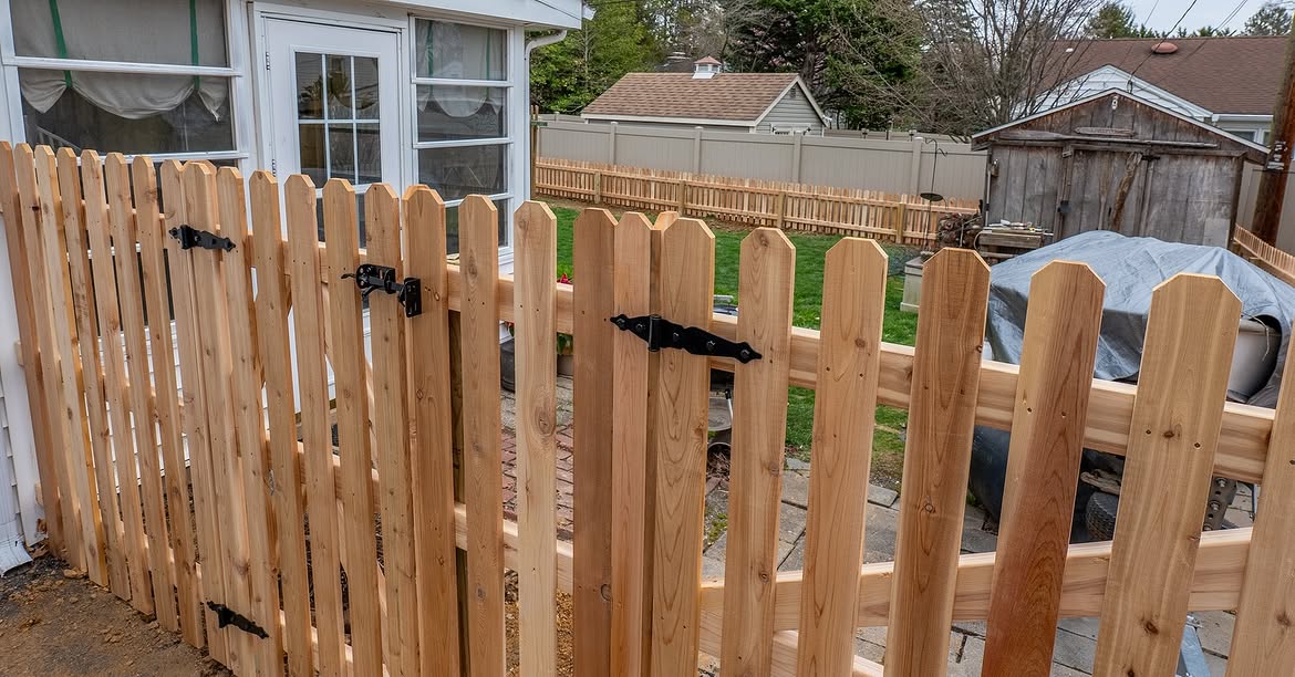 Gate detail of cedar picket fence in Wilmington, DE