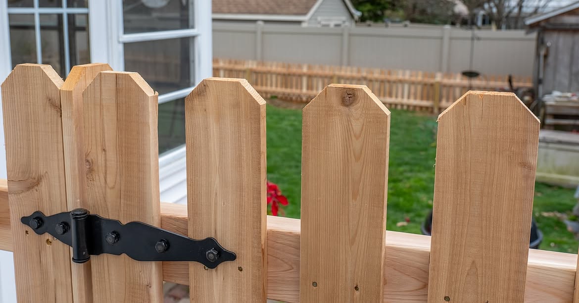Gate and fence view of cedar picket fence in Wilmington, DE